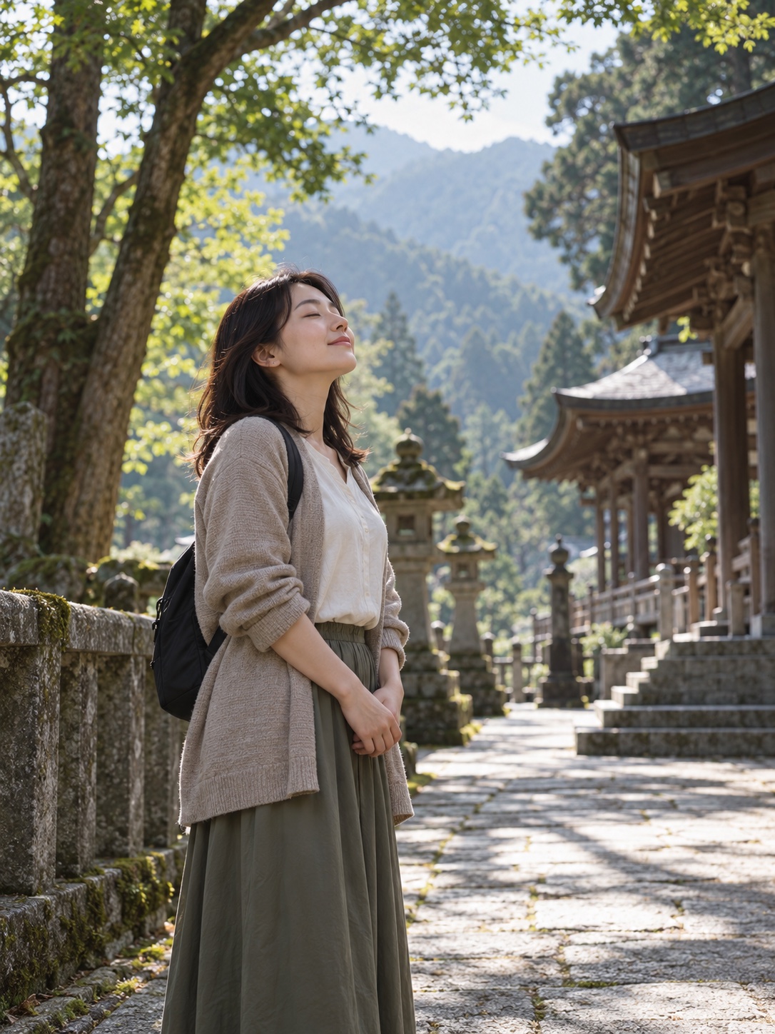 A visitor pausing on a quiet temple walkway